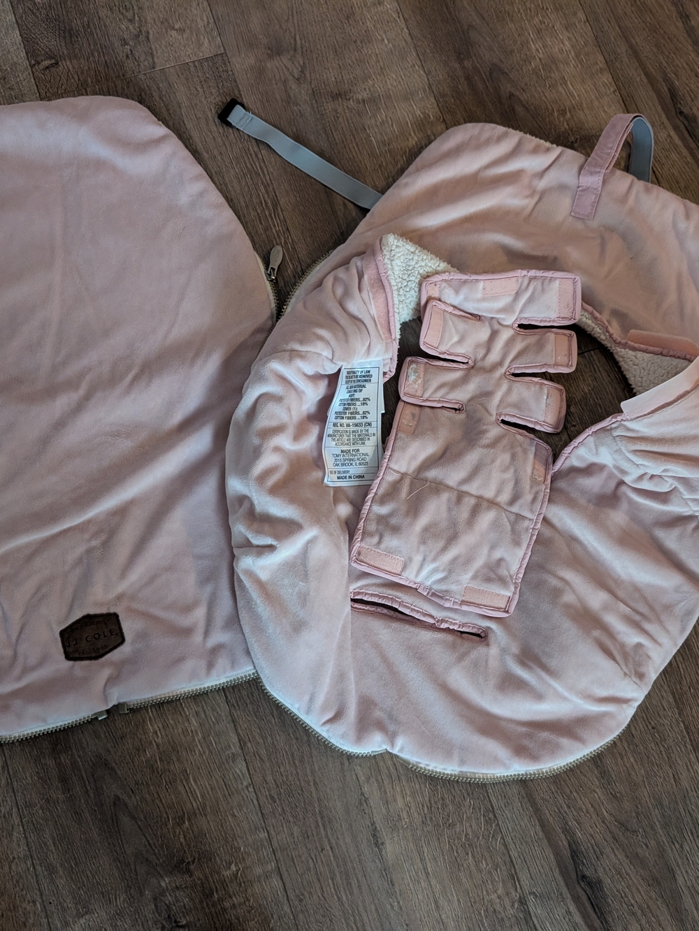 JJ Cole Pale Pink Plush Baby Insert with Brown Logo Patch